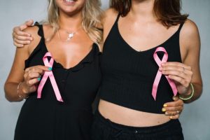 Two Women with Pink Cancer Ribbons